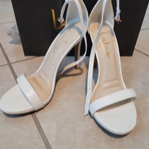 Lulu's white heels